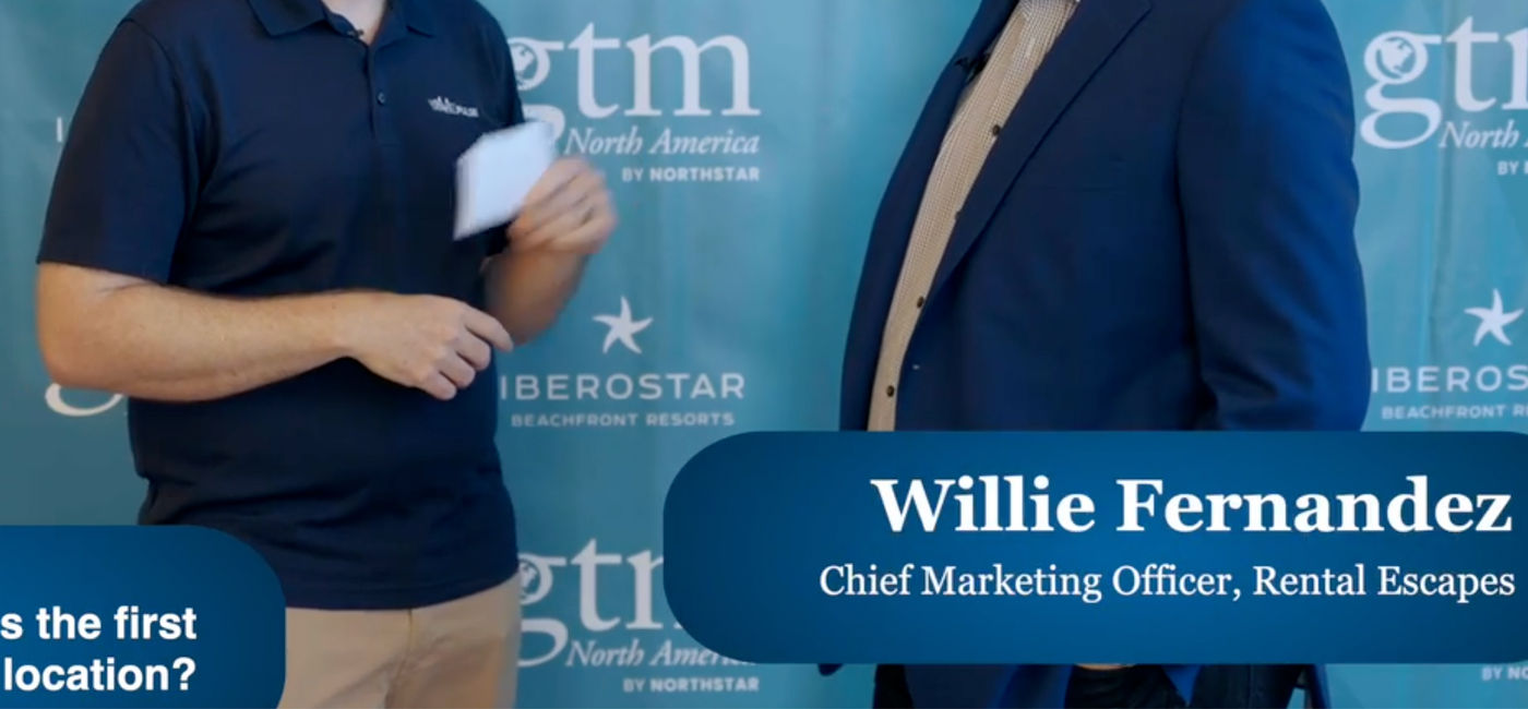 Photo: Editor-in-Chief Eric Bowman quizzes Willie Fernandez, Chief Marketing Officer at Rental Escapes. (Photo Credit: Northstar Travel Group)