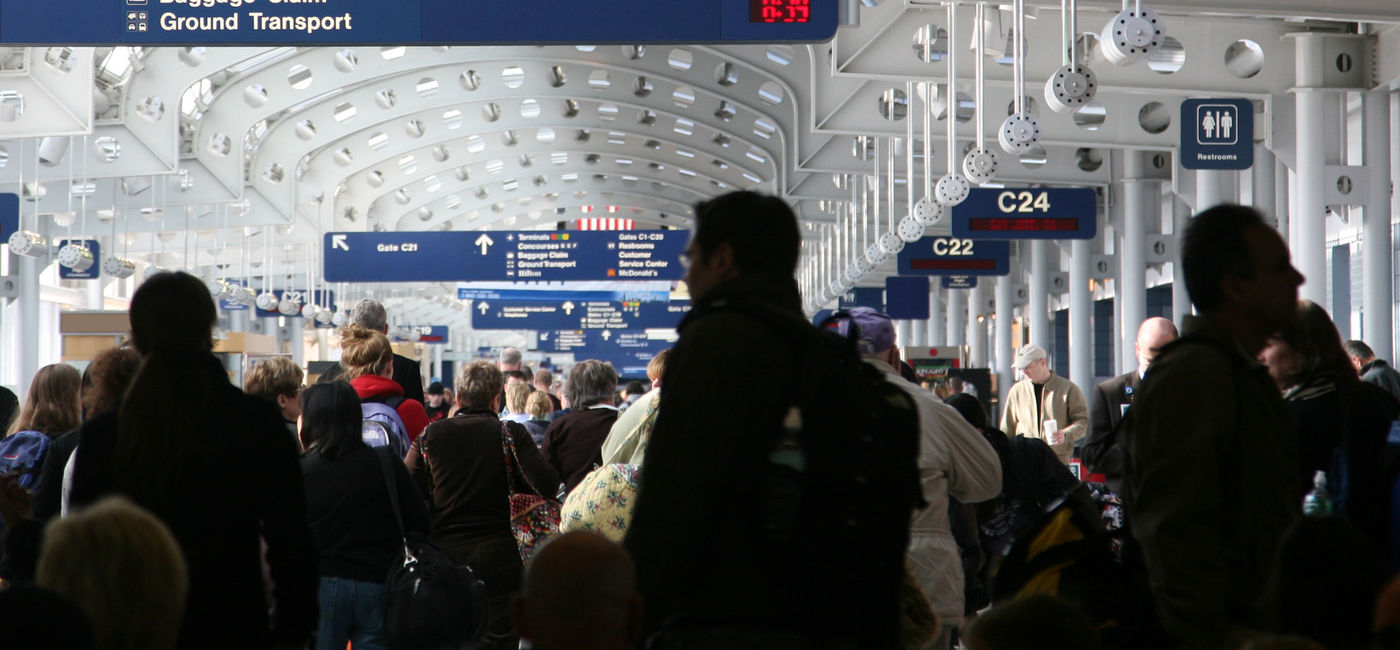 Image: Busy airport terminal. (photo via iStock/Getty Images E+/Terraxplorer)