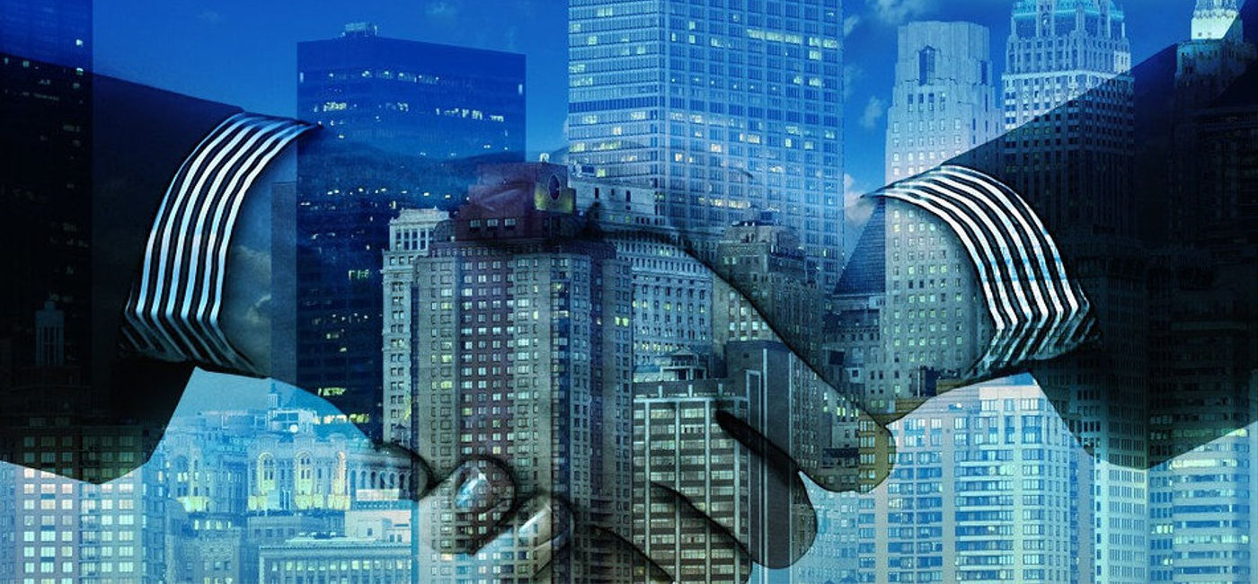 Image: PHOTO: Business handshake. (photo via Pixabay)