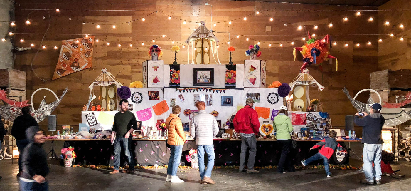 Image: A traditional ofrenda at a Dia de los Muertos event in Yakima Valley, WA. (Photo Credit: Yakima Valley Tourism)
