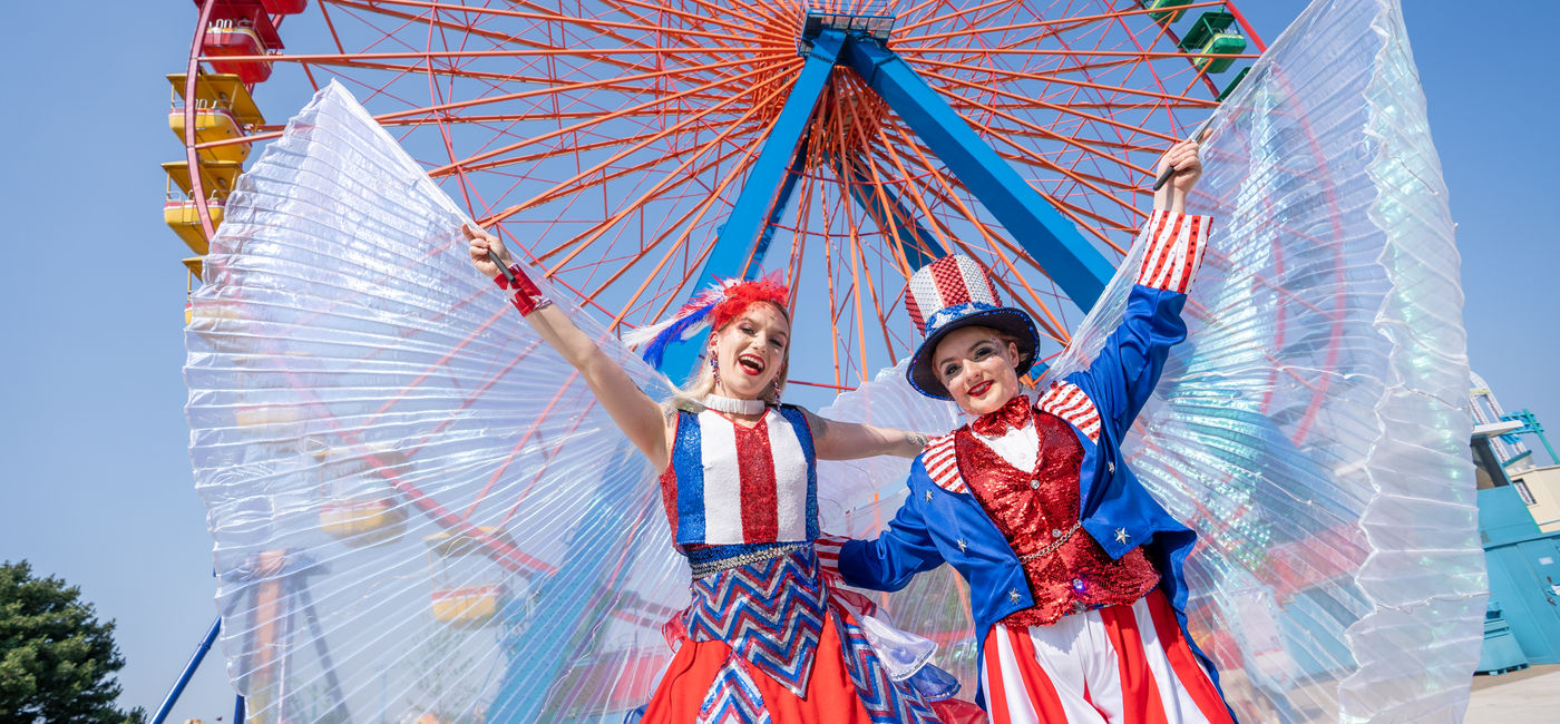 Image: Patriotic street performers at Cedar Point. (Photo Credit: Six Flags Entertainment Corporation)