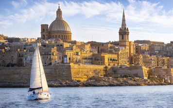 Coast of Valletta, Malta, with sailboat