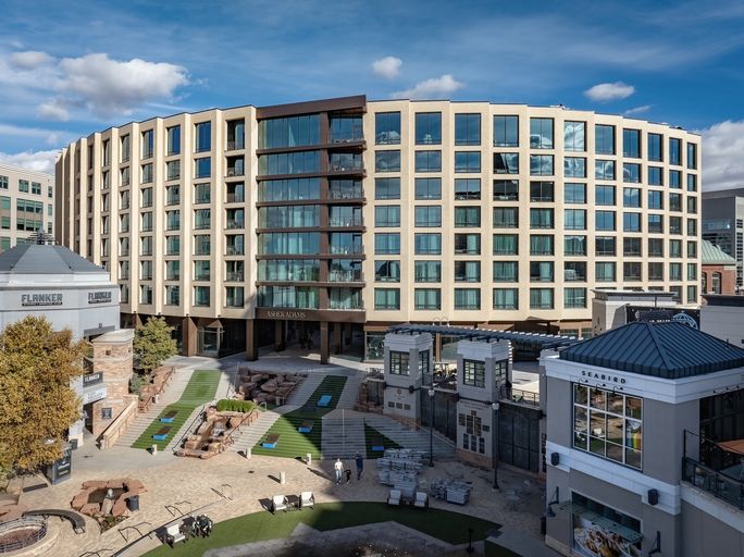 The hotel includes an eight-story addition as well as the site of the original train depot.