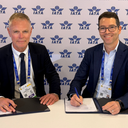 John Weatherill, WestJet Executive Vice-President and Chief Commercial Officer and Helgi Már Björgvinsson, Icelandair Head of Airline Partnerships & International Relations sign reciprocal codeshare agreement at the 2026 IATA AGM.