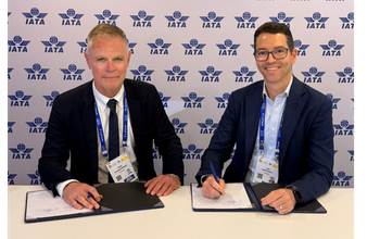 John Weatherill, WestJet Executive Vice-President and Chief Commercial Officer and Helgi Már Björgvinsson, Icelandair Head of Airline Partnerships & International Relations sign reciprocal codeshare agreement at the 2026 IATA AGM.