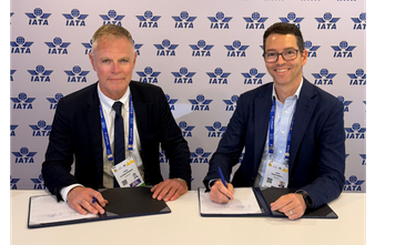 John Weatherill, WestJet Executive Vice-President and Chief Commercial Officer and Helgi Már Björgvinsson, Icelandair Head of Airline Partnerships & International Relations sign reciprocal codeshare agreement at the 2026 IATA AGM.