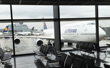 A Lufthansa 747 is seen from the concourse at Frankfurt Airport in Germany