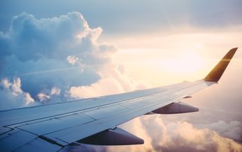 Wing of Airplane in Sky