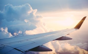 Wing of Airplane in Sky