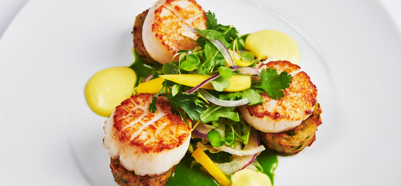Image: Chef Jennifer Jasinski's pan-seared scallops, served in Windstar Cruises' Amphora restaurant  (Photo Credit: Windstar Cruises)
