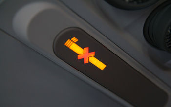 No smoking sign on a plane. 