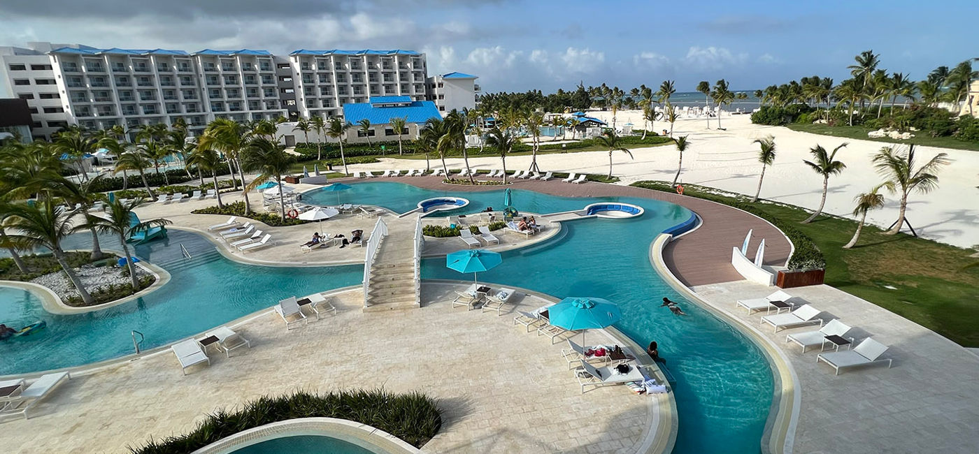 Image: The pool area and beach at Dreams Cap Cana Resort & Spa. (Photo Credit: Paul Heney)