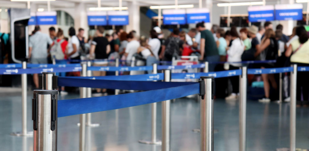 Queue for customs and immigration screening at an airport.
