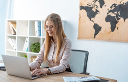 Travel advisor working from a laptop