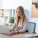Travel advisor working from a laptop