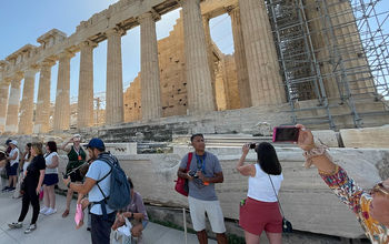 Crowds of tourists at the Acropolis in Athens, Greece