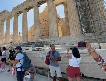 Crowds of tourists at the Acropolis in Athens, Greece