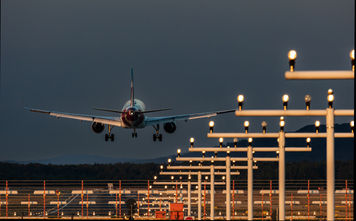 Aircraft on evening approach to Nuremberg International Airport in Germany.