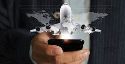 Business traveler using a mobile phone.