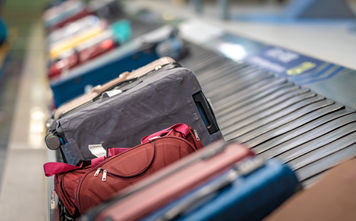Checked luggage at baggage claim