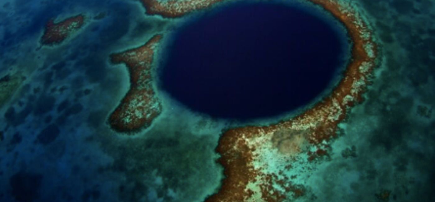 Image: The magnificent Blue Hole is one of the natural wonders that Belize offers its visitors. (Photo via Belize Tourism Board).