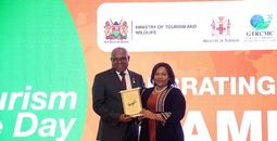 Hon. Edmund Bartlett receives his Resilience Lifetime Achievement Award from Hon. Rebecca Miano, Cabinet Secretary for Tourism and Wildlife of Kenya, on February 18, 2026.