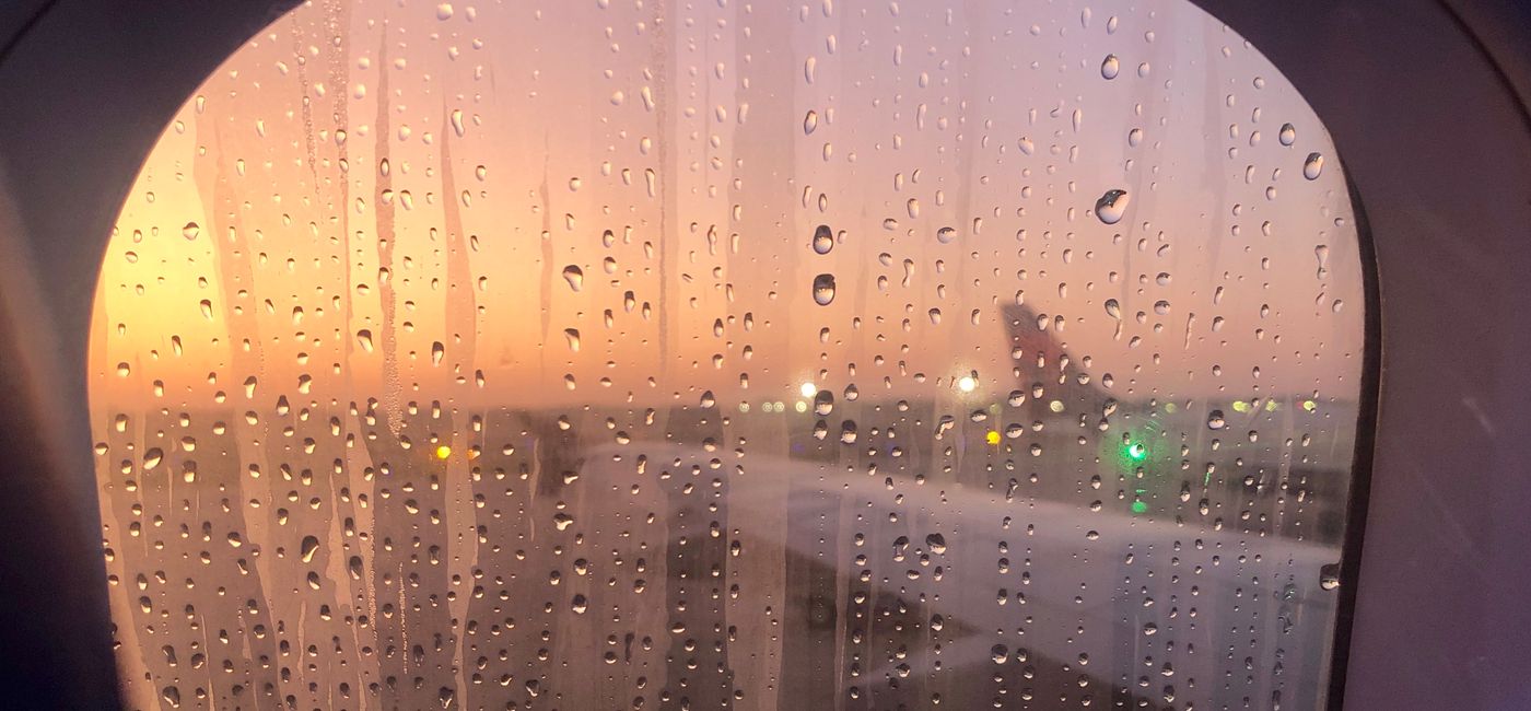 Image: A rainy airplane window. (photo by Codie Liermann)