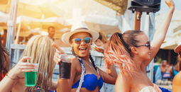 Spring Breakers partying on the beach.
