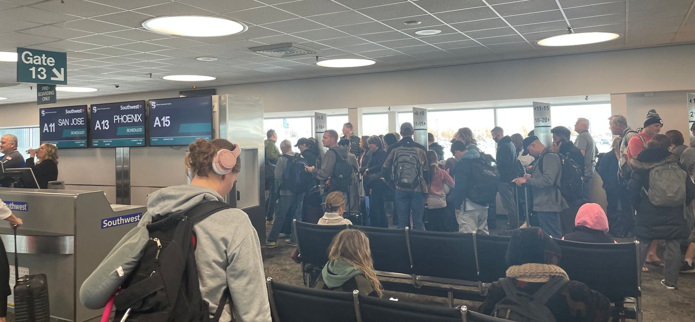 Image: Passengers waiting to board a Southwest Airlines flight at Spokane International Airport. (Photo Credit: Patrick Clarke)
