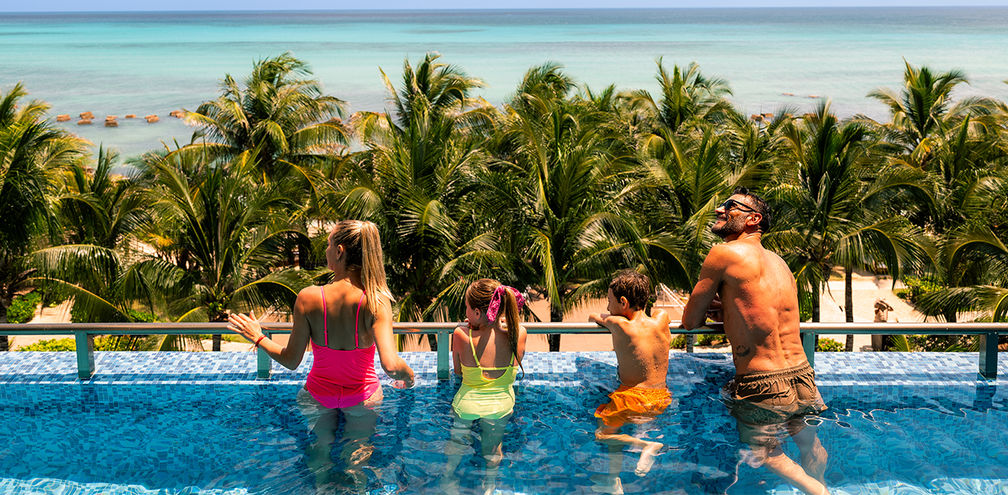A family at Generations Riviera Maya