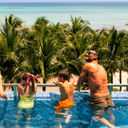 A family at Generations Riviera Maya