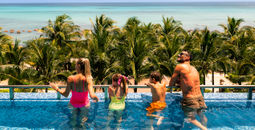 A family at Generations Riviera Maya