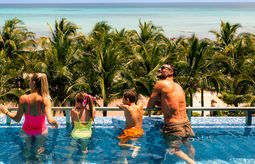 A family at Generations Riviera Maya