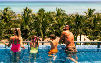 A family at Generations Riviera Maya