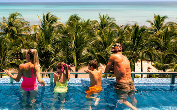 A family at Generations Riviera Maya