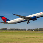 Delta Air Lines plane taking off from Amsterdam's Schiphol Airport