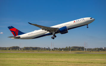 Delta Air Lines plane taking off from Amsterdam's Schiphol Airport