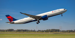 Delta Air Lines plane taking off from Amsterdam's Schiphol Airport