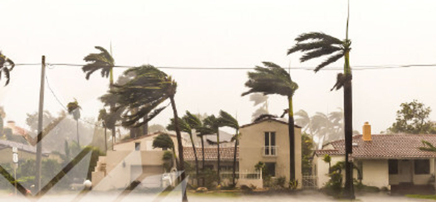 Image: A residential neighborhood during a severe storm with strong winds and heavy rain. (Photo Credit: CNW Group/Global Affairs Canada)