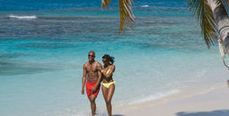 Romance Month in Antigua & Barbuda, beach, caribbean, couple, black traveler,