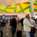 A view of Global Entry kiosks through a long line at Dallas Fort Worth airport
