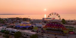 The sun goes down at Wasaga Beach during the Town's annual midway.