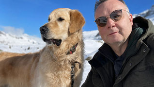Philippe Benoist, founder of MyDogCanFly.com, with golden retriever, Bailey.