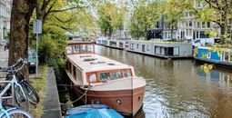 Houseboats along a canal in Amsterdam