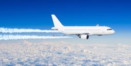 White aircraft big two engines aviation airport contrail clouds