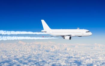 White aircraft big two engines aviation airport contrail clouds