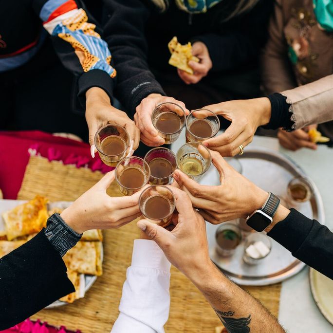 Sharing drinks and food in Morocco. Sharing drinks and food in Morocco.