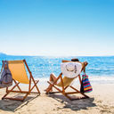 Woman lounging on the beach