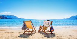 Woman lounging on the beach