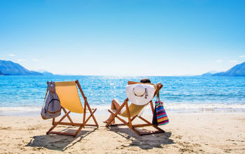Woman lounging on the beach